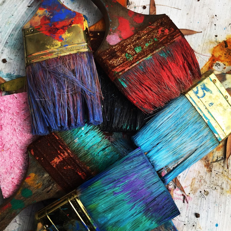 Artists mixing paint