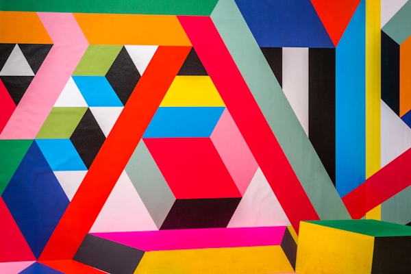 Large-scale colourful abstract canvas in studio setting
